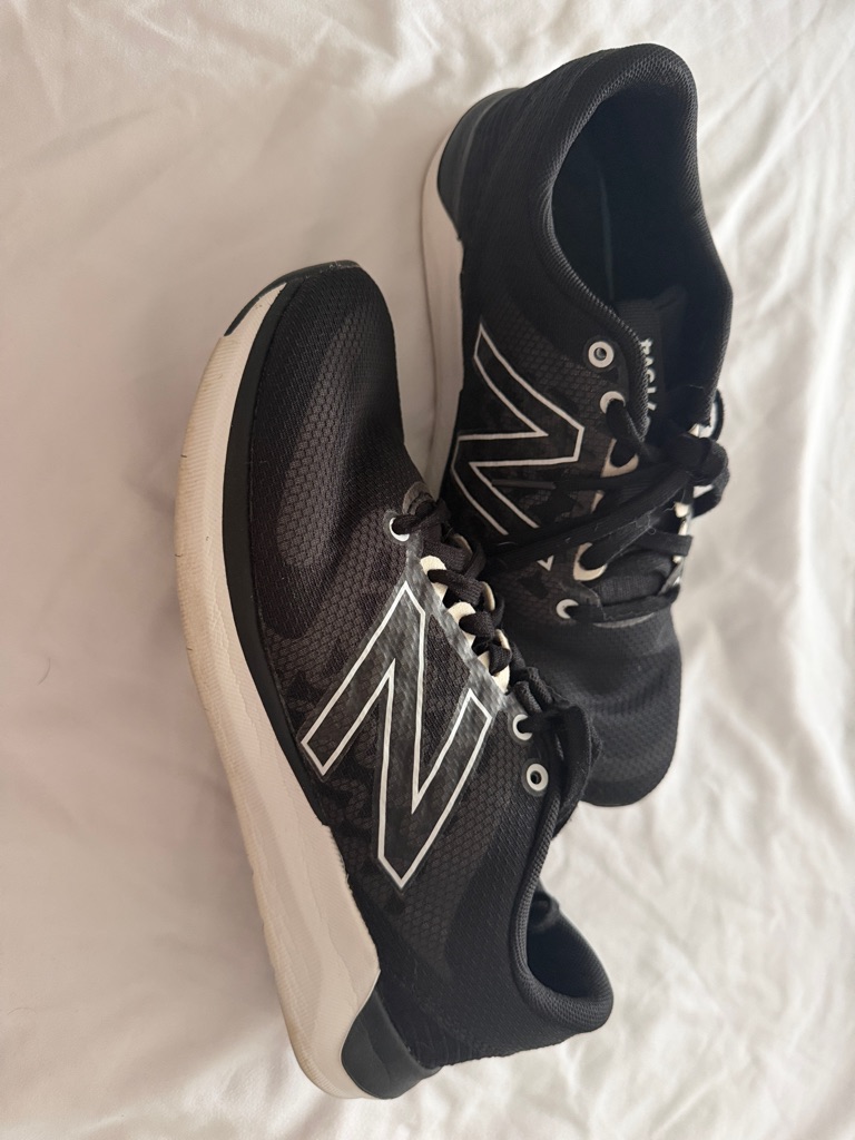 New Balance Black Athletic Running Shoes With White Accents